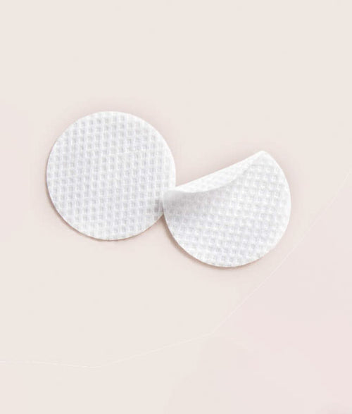 Even & Correct Brightening 2 Pads on beige background